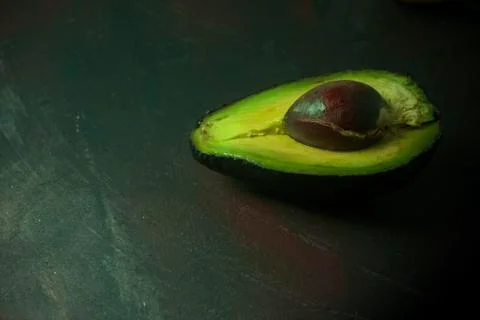 A avocado isolate on a rustic table Stock Photos