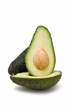 Avocado with its seed. Stock Photos