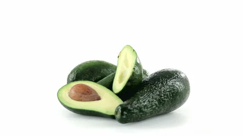 Avocado many cut in half front view Vidéo 23730802