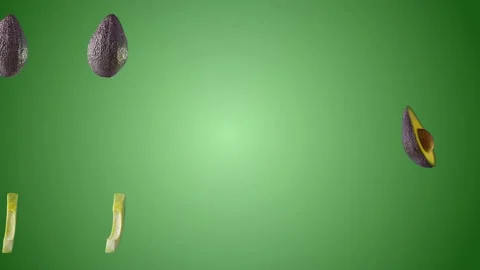 Avocado moves sideways on green background Stock Footage 131004298