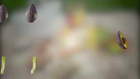Avocado moves sideways on picnic background Stock Footage 131004459
