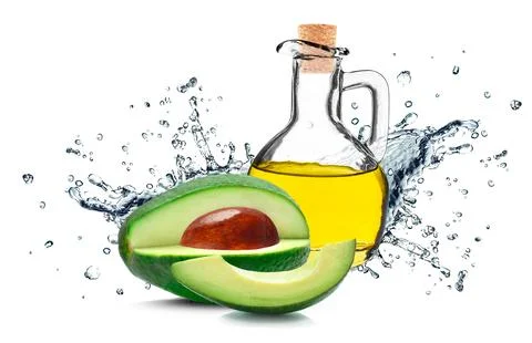 Avocado oil splash Stock Photos