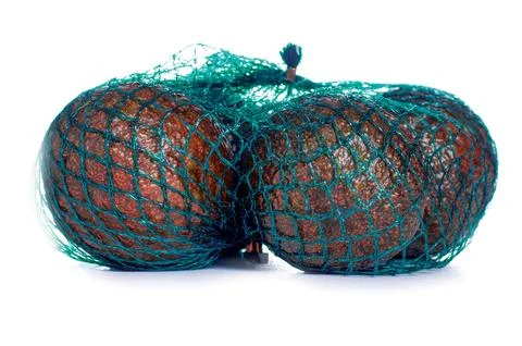 Avocado in package grin string bag Stock Photos