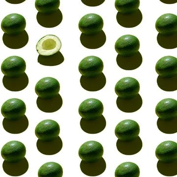 Avocado pattern. Creative summer food concept. Green avocadoes. Photos