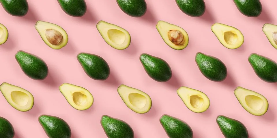 Avocado pattern on pink background. Pop art design, creative summer food concept Stock Photos