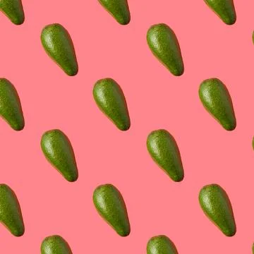 Avocado pattern on pink background. Top view. 스톡 사진