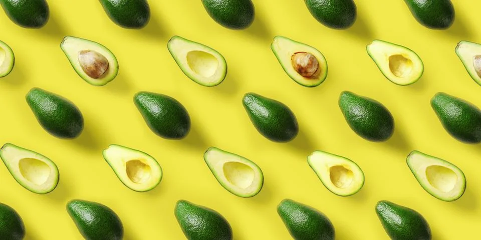 Avocado pattern on yellow background. Pop art design, creative summer food Stock Photos