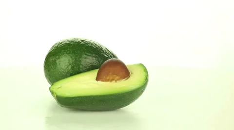 Avocado rotates on a white background Stock Footage 37484486