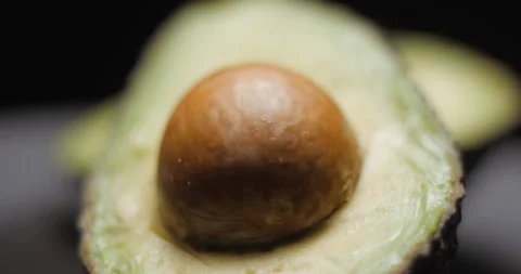Avocado rotating opening close up, studio close up Vídeo Stock 254134333