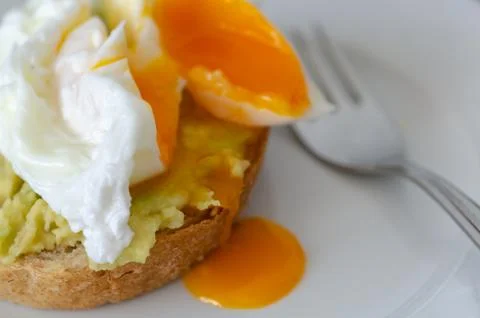 Avocado Sandwich with Pushing Egg Stock Photos