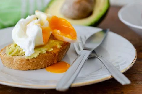 Avocado Sandwich with Pushing Egg Stock Photos