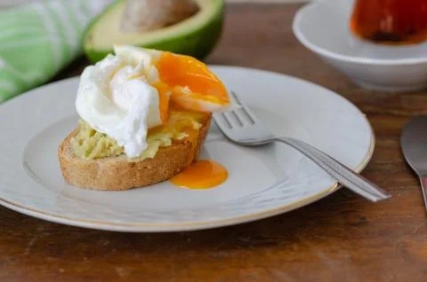 Avocado Sandwich with Pushing Egg Stock Photos