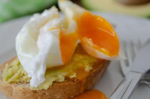 Avocado Sandwich with Pushing Egg Stock Photos