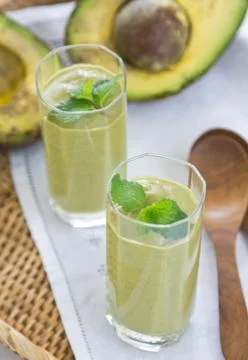 Avocado smoothie Stock Photos