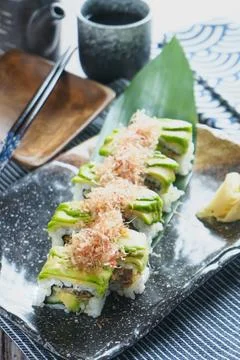 Avocado Soft Shell Crab Roll with Bonito Flakes in tray side view of Japane.. Stock Photos