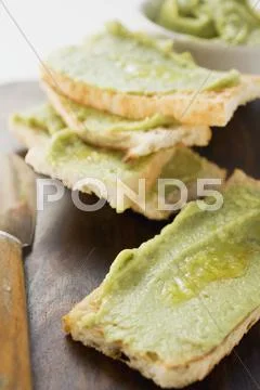 Avocado spread on bread Stock Photos