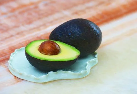 Avocado on the table Stock Photos