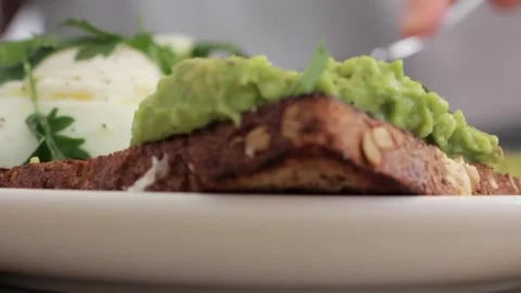 Avocado Toast Breakfast Closeup. Stock Footage 305808247