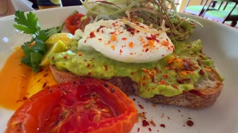Avocado Toast Poached Eggs Close Up Cafe Brunch Food Stock Footage 333828000