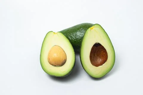 Avocado on a white background.  Stock Photos