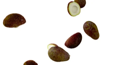 Avocados falling down in slow motion on white background. Stock Footage 252361981