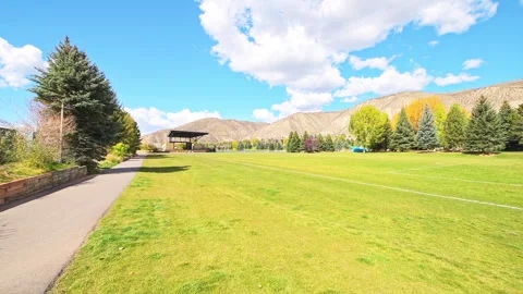 Avon Colorado small town Nottingham park lake, people on sunny autumn fall day Stock Footage 282980366