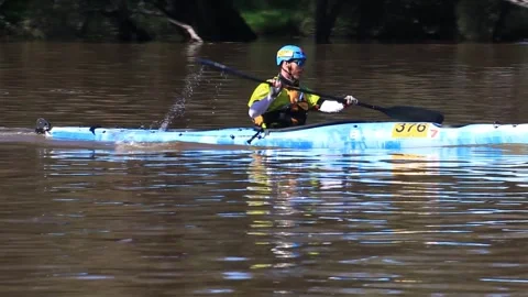 Avon Descent 2025 Day Two - Blue kayak Number 376 of Paul Turley paddling Stock Footage 328079861