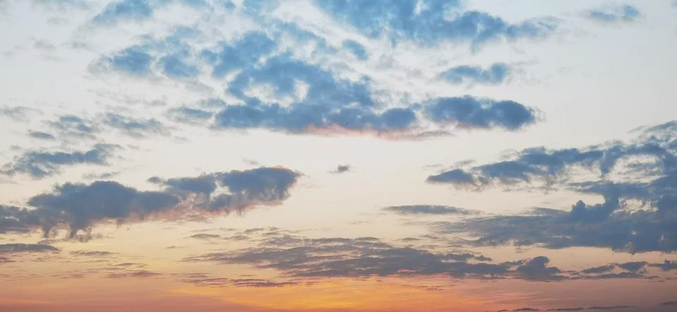 Awe-inspiring sunset paints the sky in vibrant hues Stock Photos