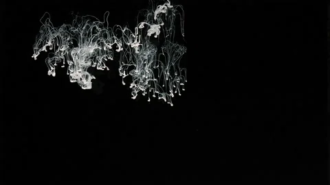 Awesome abstract background. White paint is poured into the water Stock-Footage 160672339