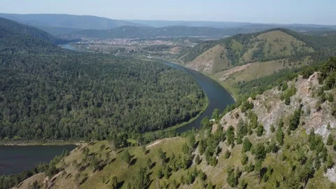 Awesome aerial view of river loop among evergreen woods Stock Footage 168547941