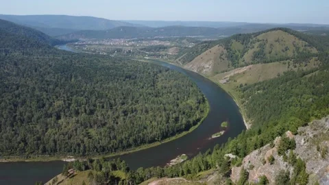 Awesome aerial view of river loop among evergreen woods Stock Footage 169128892