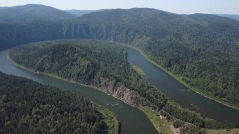 Awesome aerial view of river loop among evergreen woods Stock Footage 194698582