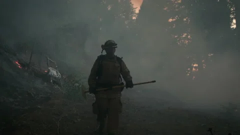 Awesome Up Close POV of Firefighter emerging through a wall of smoke Stock Footage 201344087