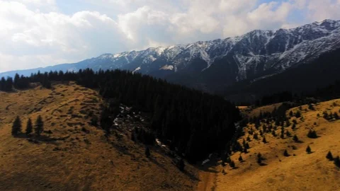 Awesome mountain side camera spin Stock Footage