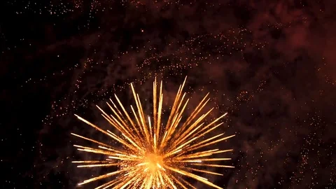Awesome multi-colored launch of multi-colored fireworks in the night sky Stock Footage 115495401