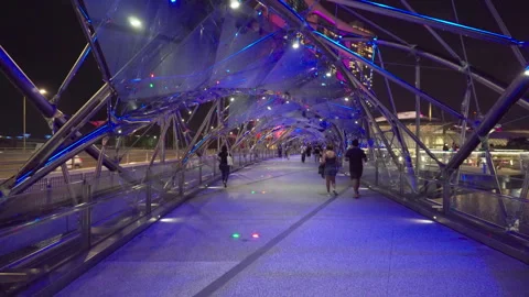 Awesome night view of the Helix Bridge in Singapore Stock Footage 279908083