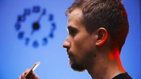 Awesome person bite a cookie in slow mov with smoke 4K Stock Footage 113845338