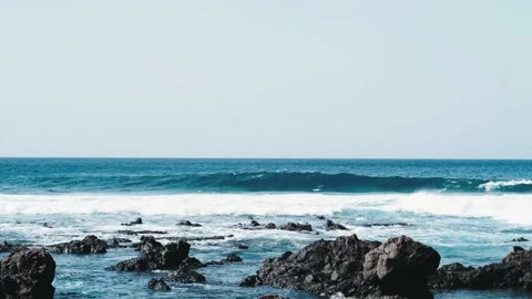 Awesome power waves breaking over dangerous rocks Stock Footage 172029012