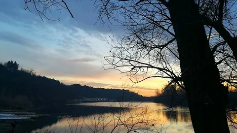 Awesome sunset by the river Stock Footage 83797647