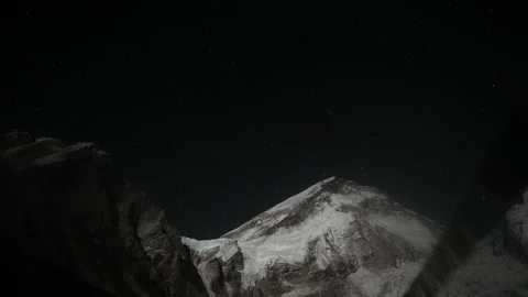 Awesome timelapse. Dark shadow cover grand snow summit. Night comes at highlands Stock Footage 167364692