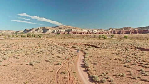 Awesome tracking SUV travels down dirt road Moab, Utah, United States Stock Footage 154666345