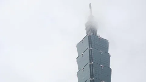 Awesome view of clouds touching Taipei 101 on rainy day Stock Footage 108655207