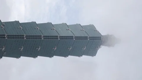 Awesome view of clouds touching Taipei 101. Vertical video Stock Footage 108655490