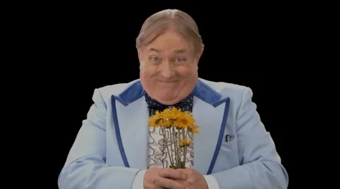 Awkward Man presenting Flowers 스톡 동영상 5163549