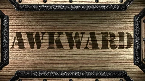 Awkward on wooden stamp Stock Footage