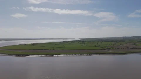 The Awre peninsula and downstream River Severn, Gloucestershire. UK Stock Footage 305640199