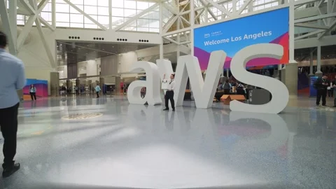 AWS logo greeting visitors Amazon AWS Summit in the hall of LA Convention Center Stock Footage 276573923