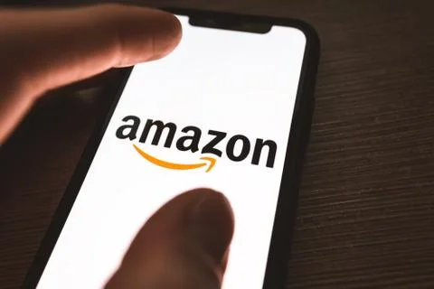 AWS logo on the smartphone screen. Foto stock