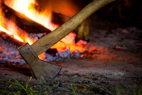 Axe and fire Stock Photos