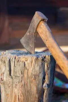Axe and logs Stock Photos